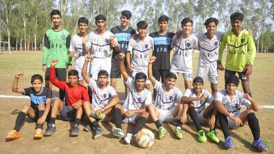 Players from the SFA team after winning the U-16 football tournament organised by the Chandigarh Police at Police Lines, Sector 26, on Friday. (Keshav Singh/HT)
