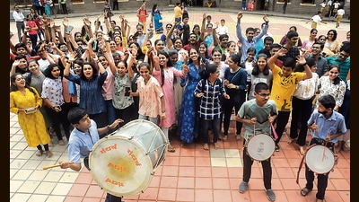Students of New English School, Tilak road celebrate with dhol-tasha after SSC or Class 10 results were declared on Friday. (HT PHOTO) Students of New English School, Tilak road celebrate with dhol-tasha after SSC or Class 10 results were declared on Friday. (HT PHOTO)