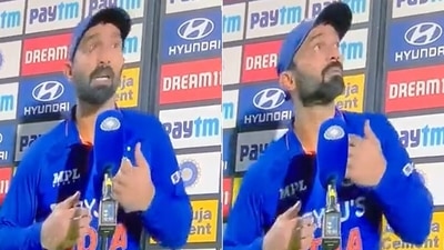 Dinesh Karthik flinched during his mid-innings interview. (Screengrab) Dinesh Karthik flinched during his mid-innings interview. (Screengrab)