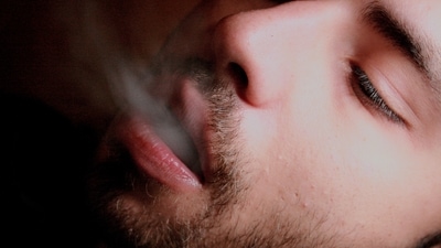 Nicotine and tar present in the cigarette causes the blood vessels to shrink, narrow and over time, cut off the oxygen supply to the lips that leads to oxidative stress and capillary rupture. Eventually, the lips become dull and faded while the heat emitted from cigarette smoke triggers the body to release melanin which causes the area around the mouth to become darker and pigmented. (Pixabay) Nicotine and tar present in the cigarette causes the blood vessels to shrink, narrow and over time, cut off the oxygen supply to the lips that leads to oxidative stress and capillary rupture. Eventually, the lips become dull and faded while the heat emitted from cigarette smoke triggers the body to release melanin which causes the area around the mouth to become darker and pigmented. (Pixabay)