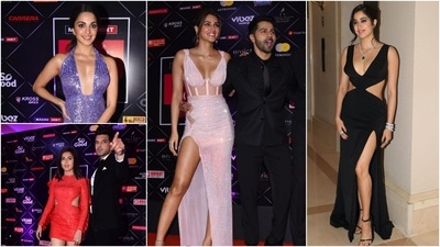 Kiara Advani, Kriti Sanon, Varun Dhawan, Janhvi Kapoor, Karan Kundrra and Tejasswi Prakash at an event. (Varinder Chawla) Kiara Advani, Kriti Sanon, Varun Dhawan, Janhvi Kapoor, Karan Kundrra and Tejasswi Prakash at an event. (Varinder Chawla)