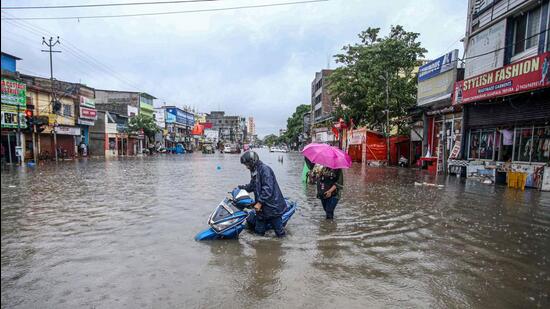Waterlogged street after heavy rains in Agartala on Friday. (PTI)