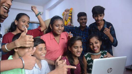 Thane, India - June 17, 2022: Students check their results on the laptop and celebrate after their SSC Exam results were declared at their tuition class, in Thane, Mumbai, on Friday, June 17, 2022. (Photo by Praful Gangurde/HT PHOTO) (HT PHOTO)