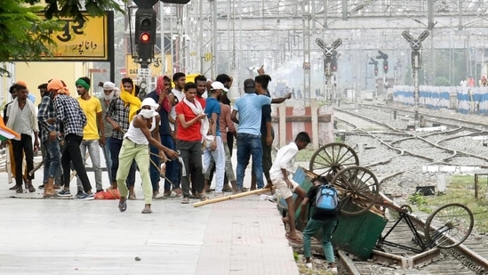 Protestors vandalise railway property at Danapur Railway Station during a protest against the Agnipath army recruitment scheme, in Patna, Bihar, India, on Friday, June 17, 2022. (Photo by Santosh Kumar/Hindustan Times)
