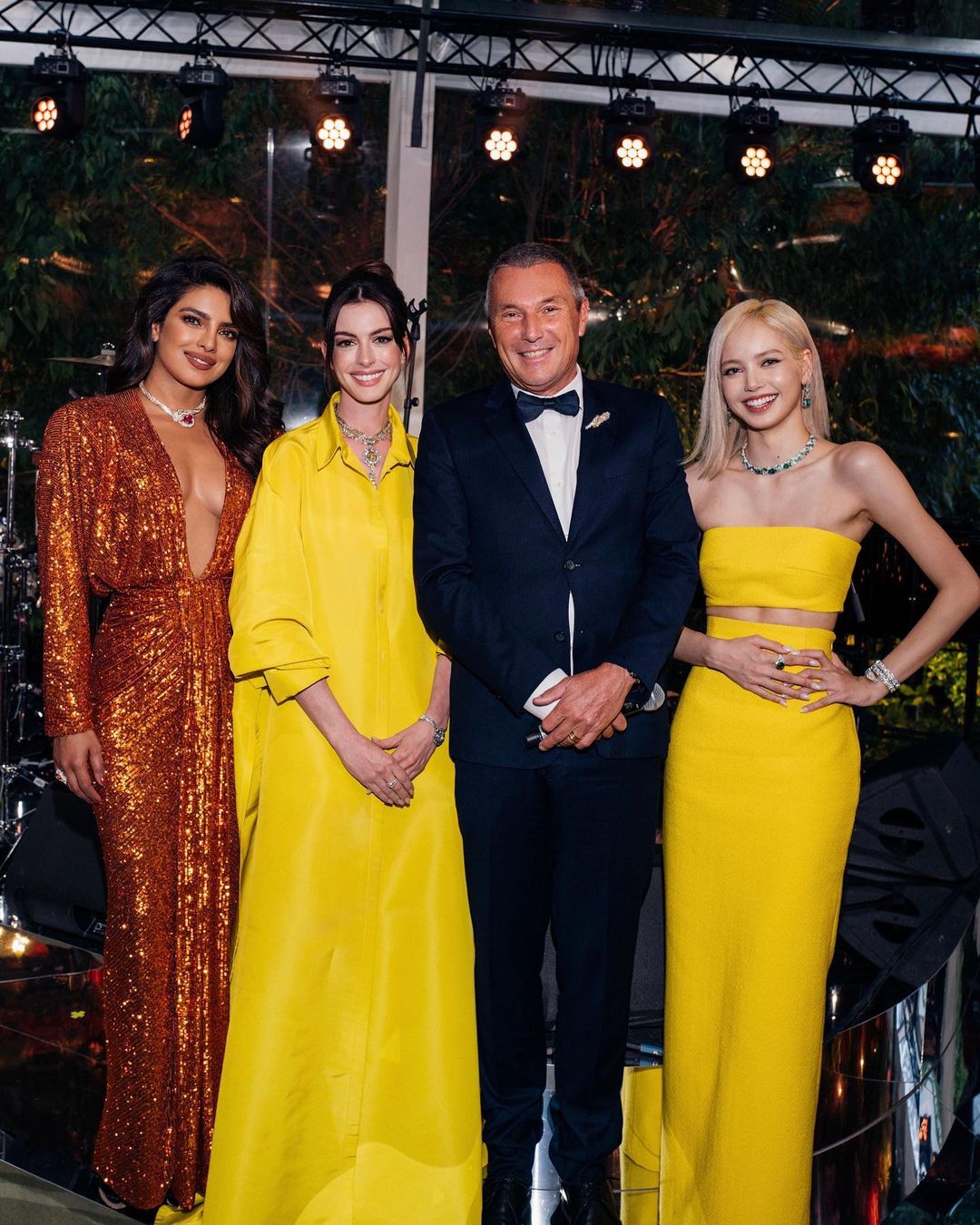 Priyanka Chopra, Anne Hathaway, and Lisa pose with Bulgari CEO Jean Christophe Babin. Priyanka Chopra, Anne Hathaway, and Lisa pose with Bulgari CEO Jean Christophe Babin.