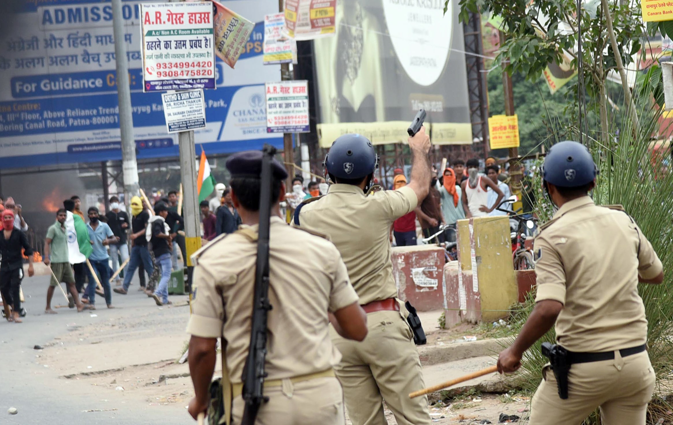 Police open fire in air to disperse the protestors during a demonstration against the Agnipath scheme for the Armed Forces, in Danapur, Bihar on June 17, 2022. (ANI Photo) Police open fire in air to disperse the protestors during a demonstration against the Agnipath scheme for the Armed Forces, in Danapur, Bihar on June 17, 2022. (ANI Photo)