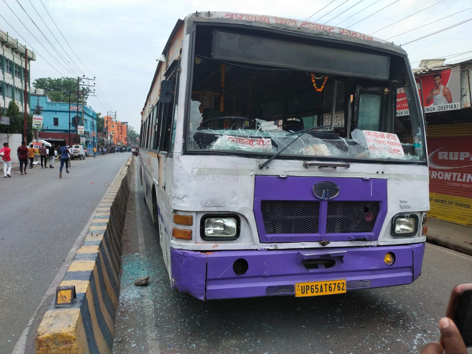 A bus damaged by protesters in Varanasi A bus damaged by protesters in Varanasi