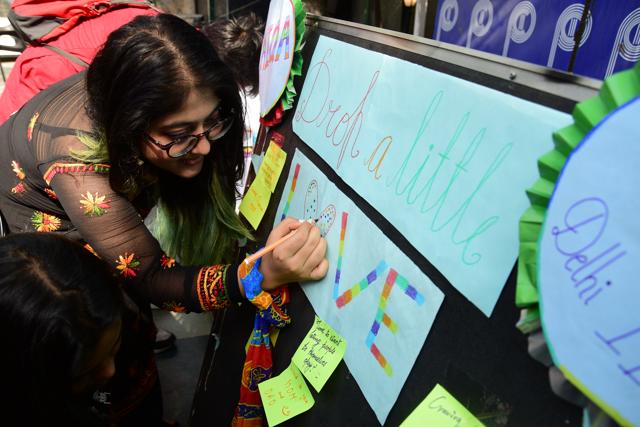 Activities such as writing love messages for one another were part of the event. (Photo: Manish Rajput/HT) Activities such as writing love messages for one another were part of the event. (Photo: Manish Rajput/HT)