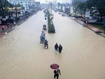 Floods are a regular menace to millions of people in low-lying Bangladesh, but experts say climate crisis is increasing their frequency, ferocity and unpredictability.(AP) Floods are a regular menace to millions of people in low-lying Bangladesh, but experts say climate crisis is increasing their frequency, ferocity and unpredictability.(AP)