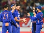 Indian bowler Avesh Khan celebrates with teammates after the wicket of South African batsman Dwaine Pretorius, during the 4th T20 cricket match. Indian bowler Avesh Khan celebrates with teammates after the wicket of South African batsman Dwaine Pretorius, during the 4th T20 cricket match.