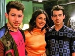 Priyanka Chopra with Jonas Brothers at a concert. Priyanka Chopra with Jonas Brothers at a concert.