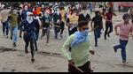 Armed with sticks and faces covered, youths rushing towards to the entrance of Ludhiana railway station, where they later burnt a block hut and vandalised furniture, on Saturday during a protest against Agnipath scheme. (Gurpreet Singh/HT) Armed with sticks and faces covered, youths rushing towards to the entrance of Ludhiana railway station, where they later burnt a block hut and vandalised furniture, on Saturday during a protest against Agnipath scheme. (Gurpreet Singh/HT)