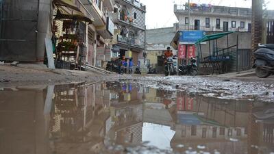 A dug-up road filled with rain water in Behlana, Chandigarh. (HT Photo) A dug-up road filled with rain water in Behlana, Chandigarh. (HT Photo)