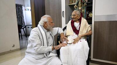 Prime Minister Narendra Modi meets his mother Heeraben Modi in Gandhinagar as she enters her hundredth year, on Saturday. (ANI/ PIB) Prime Minister Narendra Modi meets his mother Heeraben Modi in Gandhinagar as she enters her hundredth year, on Saturday. (ANI/ PIB)