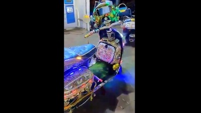 The image that shows a beautifully decorated scooter has been taken from the video shared by Anand Mahindra on Twitter. (Twitter/@anandmahindra) The image that shows a beautifully decorated scooter has been taken from the video shared by Anand Mahindra on Twitter. (Twitter/@anandmahindra)