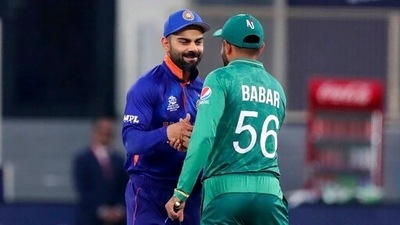 India's Virat Kohli, left, and Pakistan's captain Babar Azam (AP) India's Virat Kohli, left, and Pakistan's captain Babar Azam (AP)
