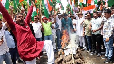 Jobless youths led by AAP leader Naveen Jaihind take out a protest march against the Agnipath scheme in Rohtak on Saturday. (Manoj Dhaka/Hindustan Times)