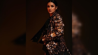 Parineeti Chopra walked the red carpet in this gorgeous hip-length jacket featuring floral metallic detailing. (Instagram/@parineetichopra) Parineeti Chopra walked the red carpet in this gorgeous hip-length jacket featuring floral metallic detailing. (Instagram/@parineetichopra)