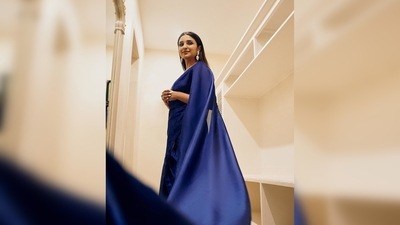 Parineeti Chopra teamed her saree with an embroidered sleeveless blouse with a plunging neckline and open back. (Instagram/@parineetichopra) Parineeti Chopra teamed her saree with an embroidered sleeveless blouse with a plunging neckline and open back. (Instagram/@parineetichopra)