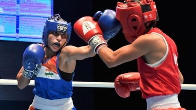 India's Manju Rani (48kg) in action. (PTI) India's Manju Rani (48kg) in action. (PTI)
