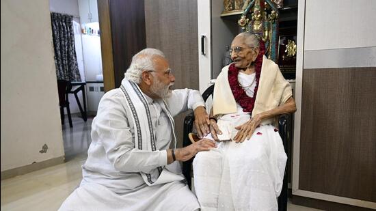 Prime Minister Narendra Modi meets his mother Heeraben Modi in Gandhinagar as she enters her hundredth year, on Saturday. (ANI/ PIB)