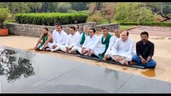 RLD leader Jayant Choudhary and party MLAs sitting on a silent protest at Kisan Ghat in Delhi in protest against the new defence recruitment scheme. (Sourced)