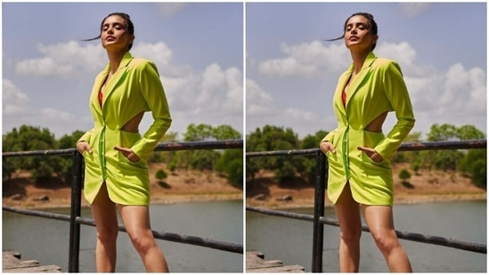 In neon pink stilettos, she gave more pop of colours to her look. Styled by fashion stylist Khyati A Busa, Aamna wore her tresses into a bun as she posed for the sun kissed pictures.(Instagram/@aamnasharifofficial)