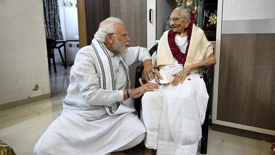 &nbsp;Prime Minister Narendra Modi meets his mother Heeraba on her 100th birthday, at her residence in Gandhinagar.(PTI)