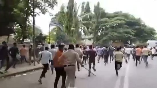 Police lathi charged against a mob of anti-Agnipath protestors in Dharwad on Saturday. (Screenshot of Twitter video)&nbsp;
