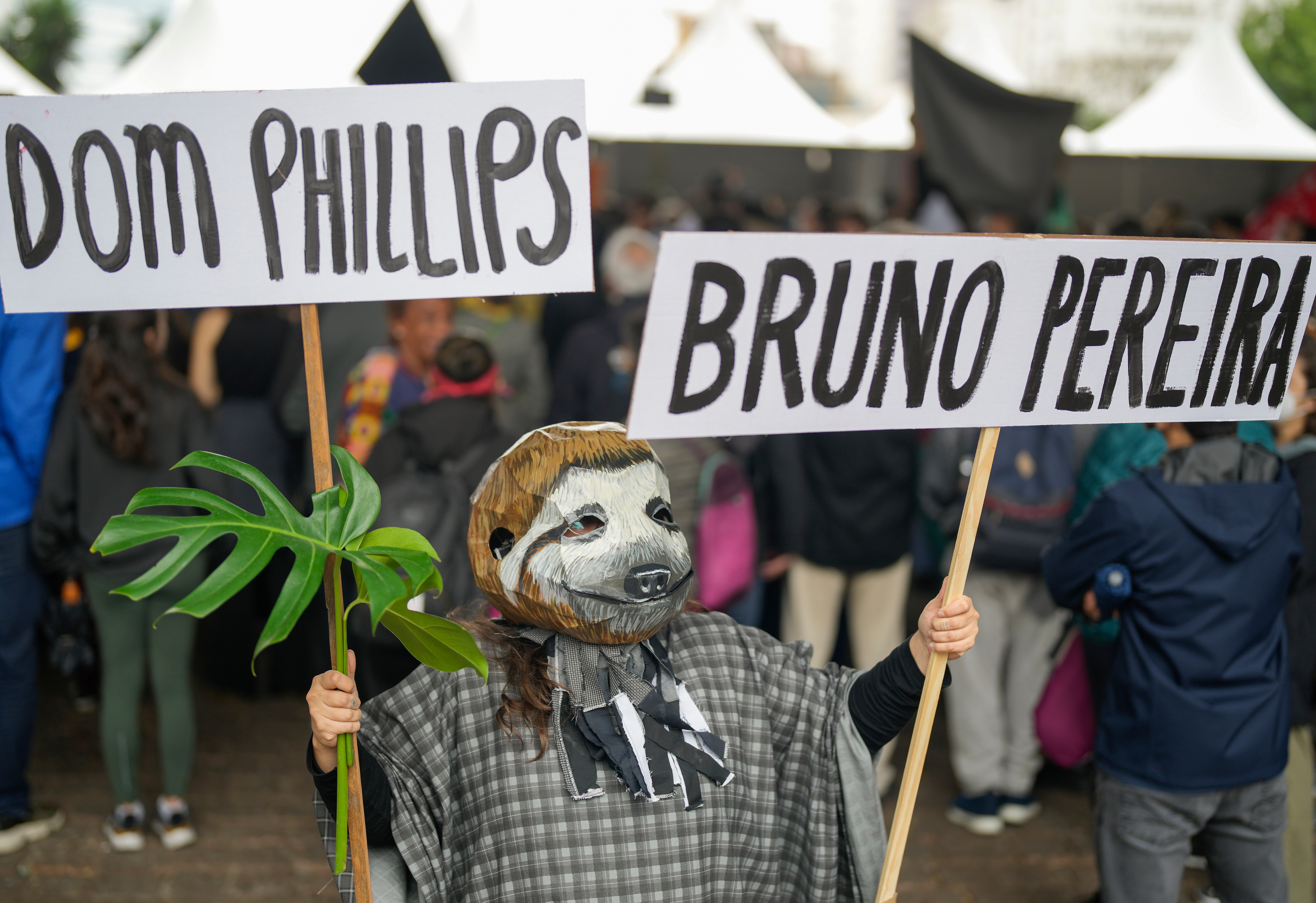 An activist wearing a sloth mask takes part in a rally in support of Dom Phillips and Bruno Perreira, demanding authorities conduct a thorough investigation into the circumstances leading to their deaths, in Sao Paulo, on June 18, 2022. (AP) An activist wearing a sloth mask takes part in a rally in support of Dom Phillips and Bruno Perreira, demanding authorities conduct a thorough investigation into the circumstances leading to their deaths, in Sao Paulo, on June 18, 2022. (AP)