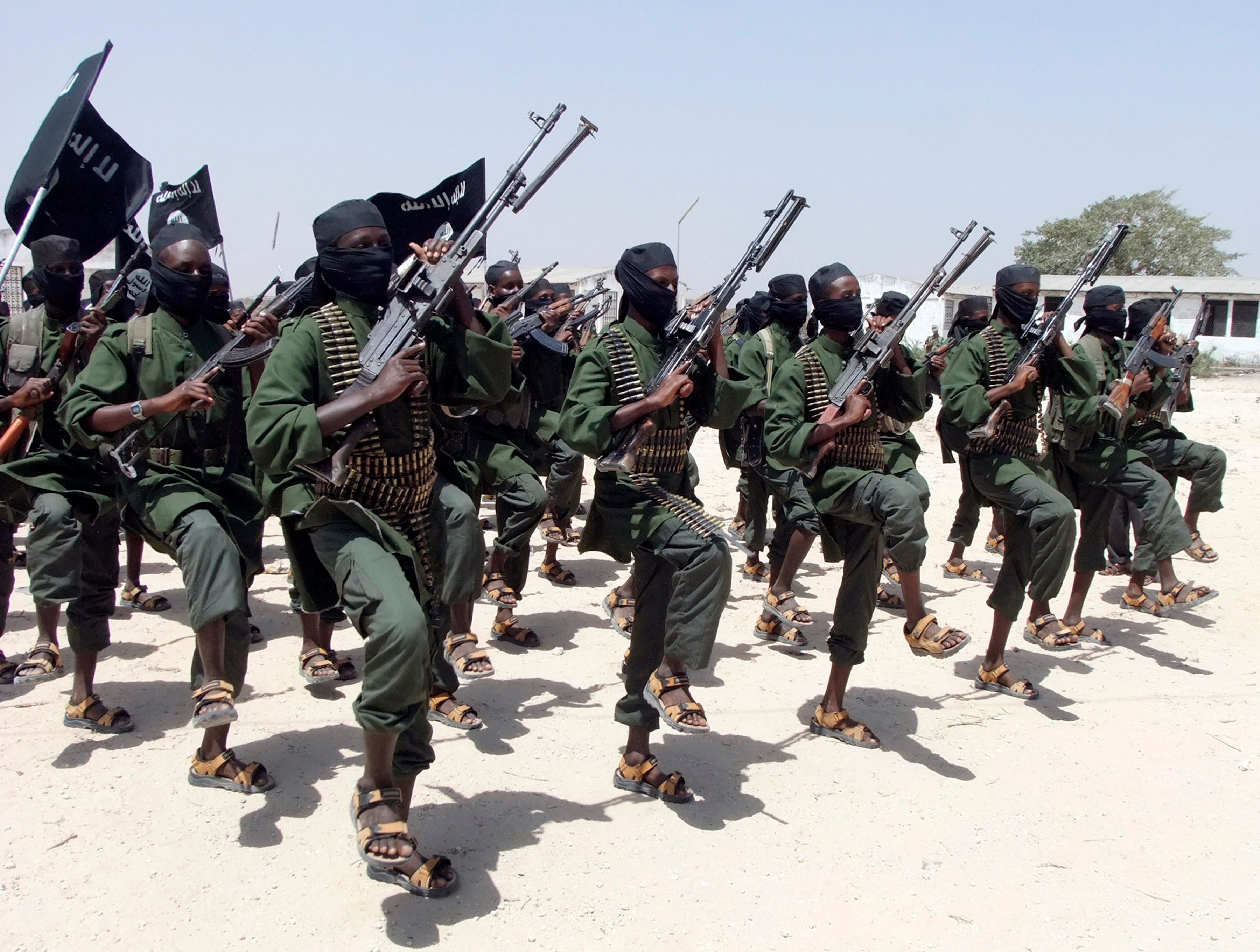 File photo of hundreds of newly trained al-Shabab fighters perform military exercises in the Lafofe area some 18 km south of Mogadishu, in Somalia.&nbsp; (AP)