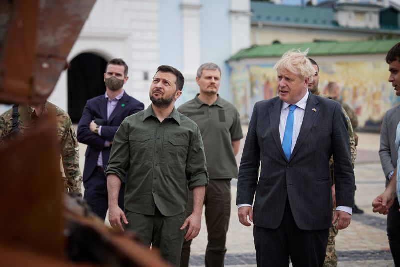 British Prime Minister Boris Johnson and Ukraine's President Volodymyr Zelenskiy visit an exhibition of destroyed Russian military vehicles and weapons at Mykhailivska Square in Kyiv, on June 17, 2022.&nbsp; (via Reuters)