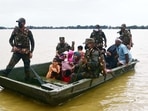 Army personnel evacuate the flood-affected victims after heavy rainfall, in the Hojai district of Assam. (ANI Photo) Army personnel evacuate the flood-affected victims after heavy rainfall, in the Hojai district of Assam. (ANI Photo)