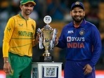 India's captain Rishabh Pant, right, and South Africa's Keshav Maharaj pose with the trophy at the start of the fifth Twenty20 cricket match(AP)