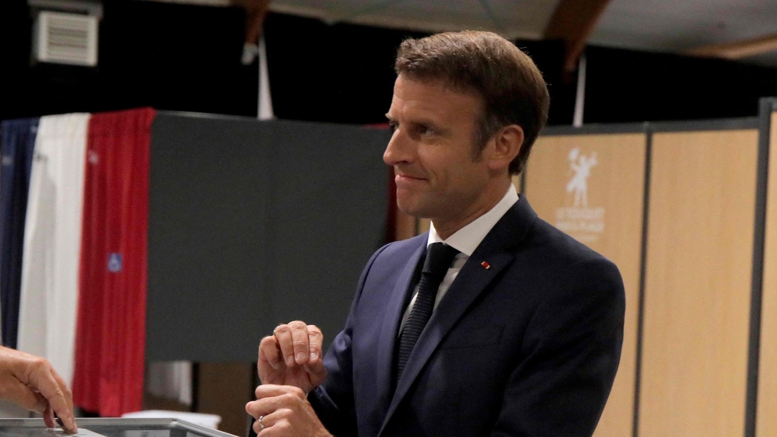 French President Macron projected to lose grip on majority in Parliament, may seek coalition