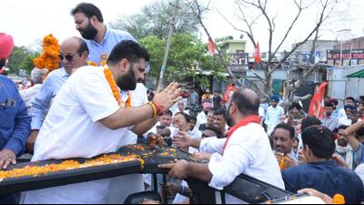 Rajya Sabha MP Kartikeya Sharma during his roadshow in Ambala City on Sunday. (HT Photo)