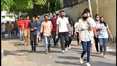 Students coming out of Jai Narayan PG College centre in Lucknow on Sunday. (Deepak gupta/ht photo)