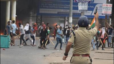 The protestors had turned violent, misbehaved and entered into a scuffle with the police and vandalised public property on Friday. (REUTERS PHOTO.) The protestors had turned violent, misbehaved and entered into a scuffle with the police and vandalised public property on Friday. (REUTERS PHOTO.)