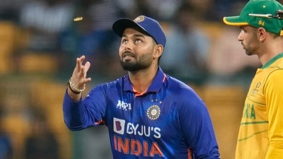India's captain Rishabh Pant tosses the coin as South Africa's Keshav Maharaj, right, watches at the start of their fifth Twenty20 cricket match (AP) India's captain Rishabh Pant tosses the coin as South Africa's Keshav Maharaj, right, watches at the start of their fifth Twenty20 cricket match (AP)