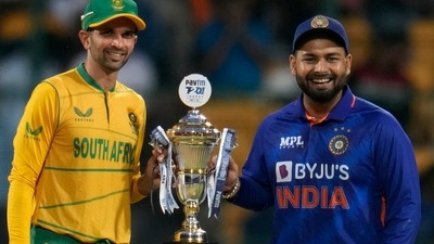 India's captain Rishabh Pant, right, and South Africa's Keshav Maharaj pose with the trophy at the start of the fifth Twenty20 cricket match (AP) India's captain Rishabh Pant, right, and South Africa's Keshav Maharaj pose with the trophy at the start of the fifth Twenty20 cricket match (AP)