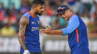 Indian cricket team head coach Rahul Dravid with cricketer Hardik Pandya (PTI) Indian cricket team head coach Rahul Dravid with cricketer Hardik Pandya (PTI)