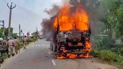 A transport vehicle after it was set on fire by protestors during Bihar Bandh in Jehanabad on Saturday (PTI) A transport vehicle after it was set on fire by protestors during Bihar Bandh in Jehanabad on Saturday (PTI)