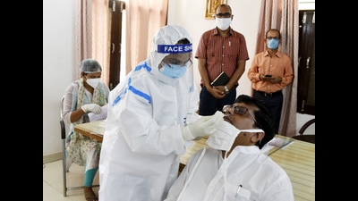 Samples for corona virus testing being taken by a medic. (FOR REPRESENTATION PURPOSE)