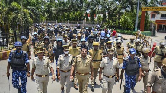 Security personnel patrolling the area near the Varanasi railway station. (PTI PHOTO)