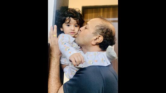 Vijay Kumar with his grandson Veer