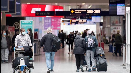 Travellers at Montreal-Pierre Elliott Trudeau International Airport in Montreal, Quebec, Canada. (Bloomberg/FILE)
