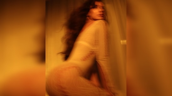 While one picture was clear, another had blurred effects. In this picture, you can only see Disha Patani's flaunting her toned body while striking a sensuous pose.(Instagram/@dishapatani)