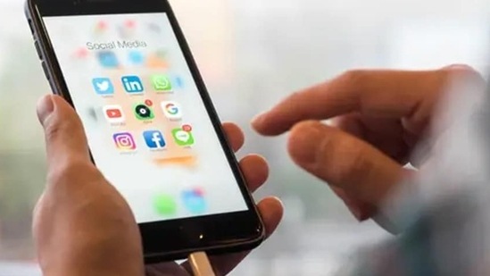Stop staring at your phone. Step out and get some fresh air.(Shutterstock)