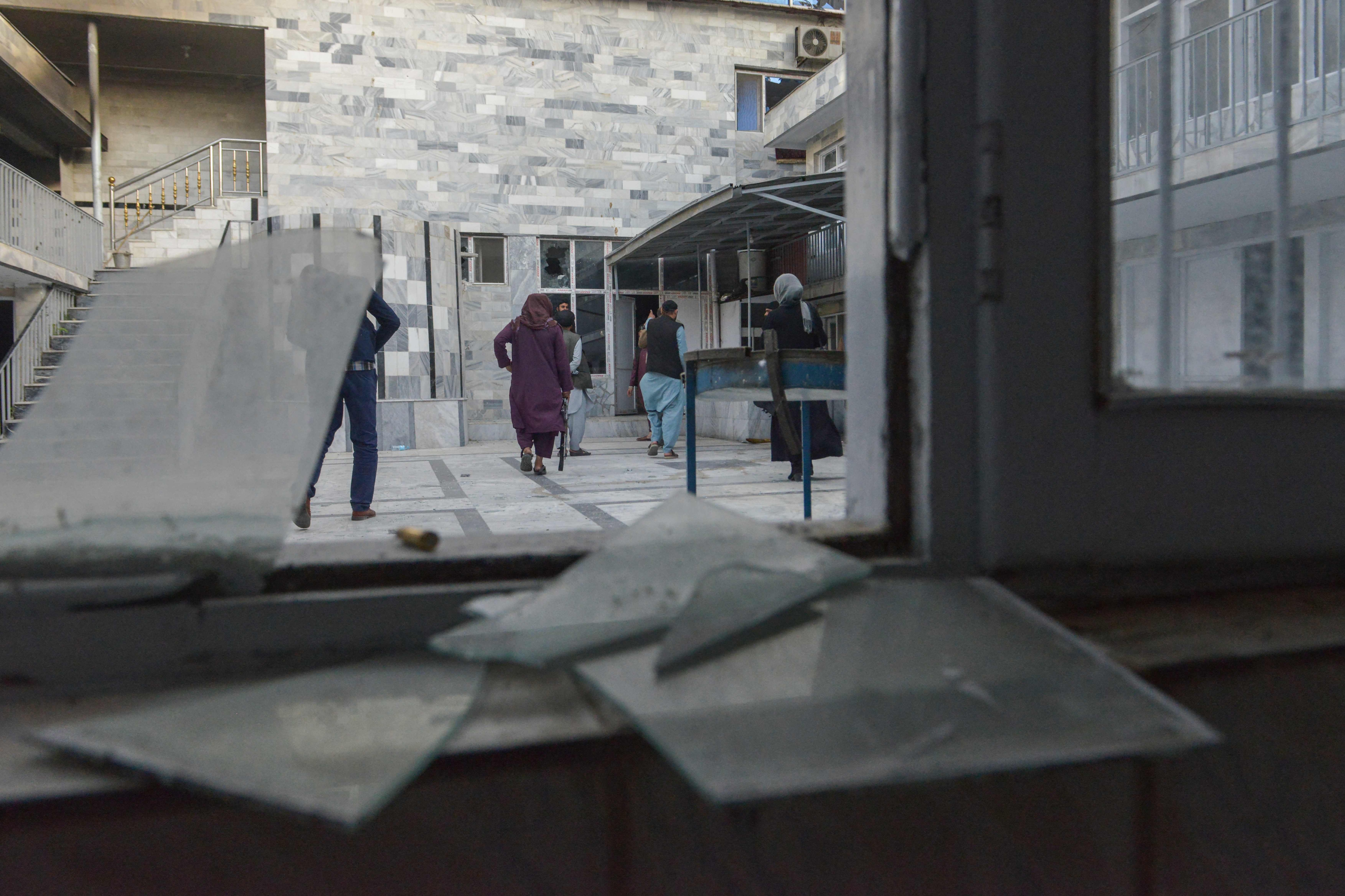 In this picture taken on June 18, 2022, Taliban fighters are pictured inside a Sikh temple following an attack by gunmen in Kabul. (AFP)