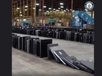 The image, taken from the video posted on Instagram by Guinness World Record, shows laptops toppled in a domino fashion.(Instagram/@Guinness World Record) The image, taken from the video posted on Instagram by Guinness World Record, shows laptops toppled in a domino fashion.(Instagram/@Guinness World Record)
